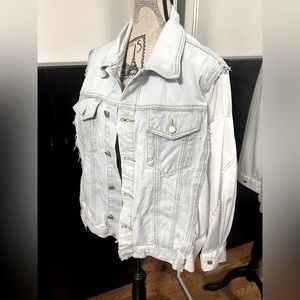 Jean jacket with windbreaker sleeves and back